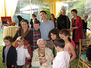 Nana enjoys a moment with her great grandchildren